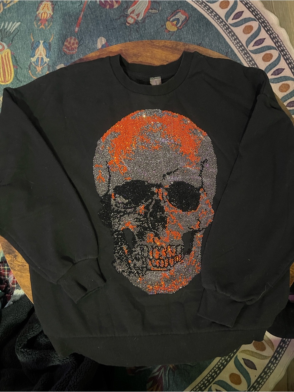 Oversized fleece bedazzled skull sweater